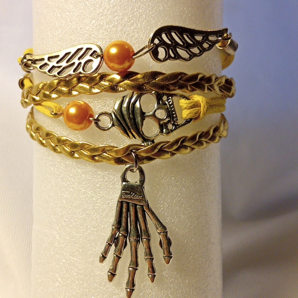 Vibrant Yellow And Gold Bracelet with Silver tone charms. 7"-8.5".